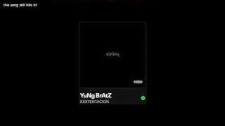 A Spotify screen showing "Yung Bratz" by XXXTentacion playing, accompanied by text that reads "this song still hits lol," indicating its relevance to the edgy school video.