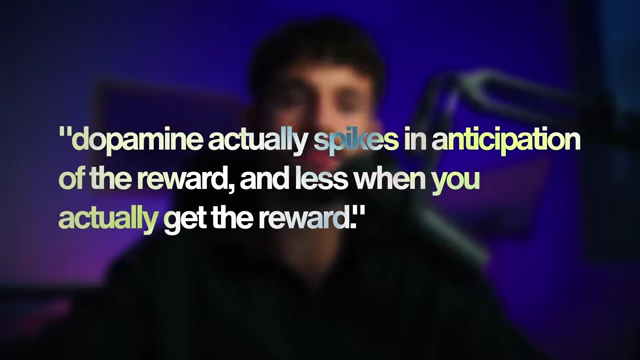 Text overlay explaining "dopamine actually spikes in anticipation of the reward, and less when you actually get the reward."