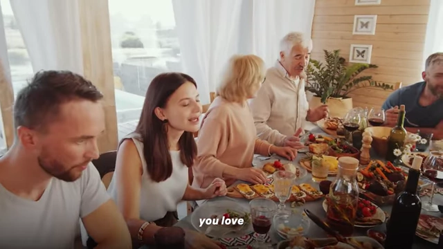 A family gathered around a table, laughing and enjoying each other's company, representing cherished relationships.