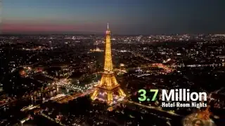 Aerial view of Paris with the Eiffel Tower illuminated at night, with text overlay "3.7 Million Hotel Room Nights".