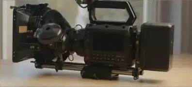 A wide shot of the Blackmagic Design PYXIS 12K camera set up on a table, ready for use