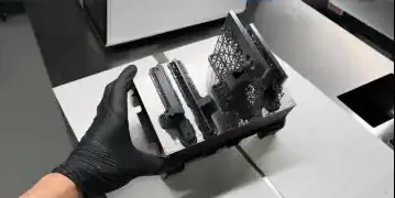 The custom 3D printed mount for the pump/reservoir