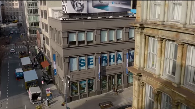 An aerial shot of the SERHANT. real estate brokerage building in New York City.