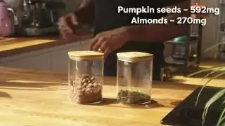 Pumpkin seeds (592mg magnesium) and almonds (270mg magnesium) displayed in clear containers.