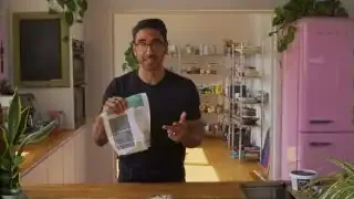 A person holding a protein powder package, emphasizing reading the label and looking for third-party testing.