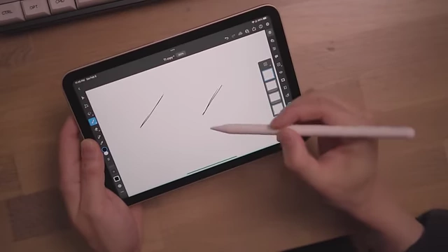 The creator demonstrating drawing on an iPad