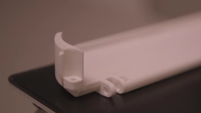 A 3D-printed part with an upside-down hole, requiring post-processing