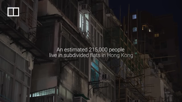 Hong Kong residential buildings, illustrating the widespread issue of subdivided flats, which house an estimated 215,000 people.