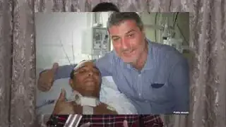 外科医生保罗·马基亚里尼与一名患者合影