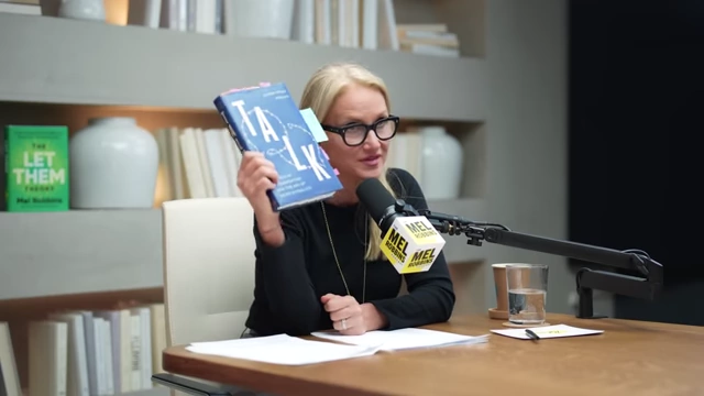 Mel Robbins holding Dr. Alison Wood Brooks' book "Talk: The Science of Conversation"