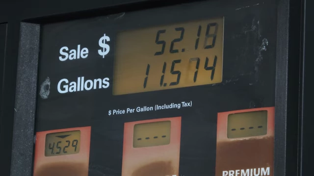 A close-up of a gas pump's digital display showing "Sale <div id=