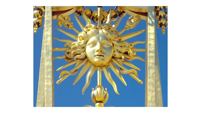 A golden sculpture depicting King Louis XIV as the "Sun King".