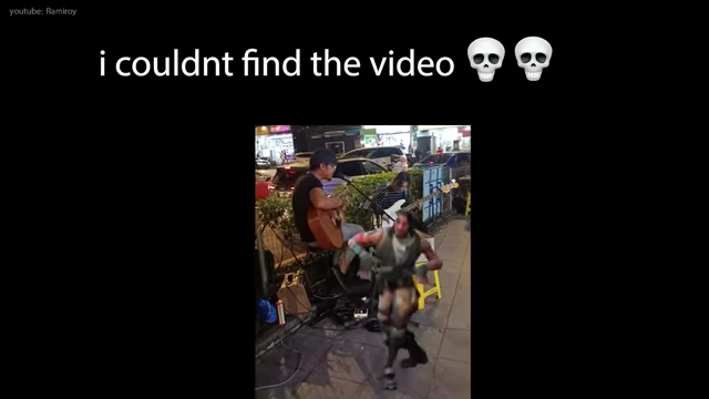 A street musician performing with an energetic dancer drawing attention from passersby.