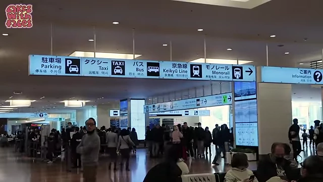 Airport signs indicating various transport options including bus and taxi