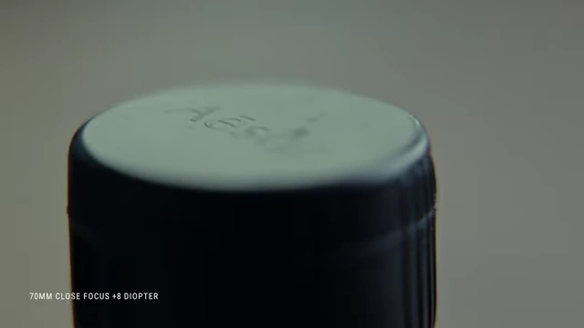 70mm telephoto lens close focus with a +8 diopter