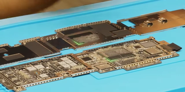 The unique "goopy black" thermal paste on the M2 MacBook Air heatsink and board