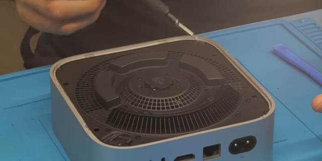 Removing the Mac Mini fan to access internal components