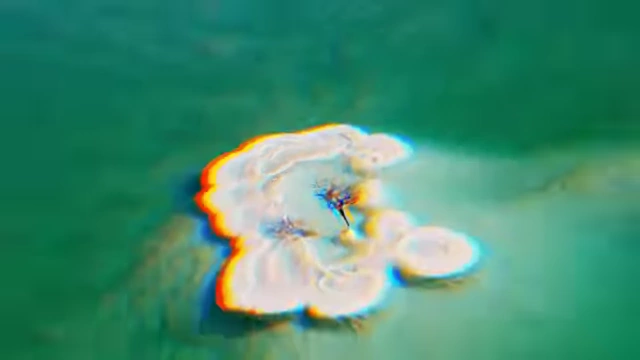 Turquoise water with salt formations, indicating critical salinity