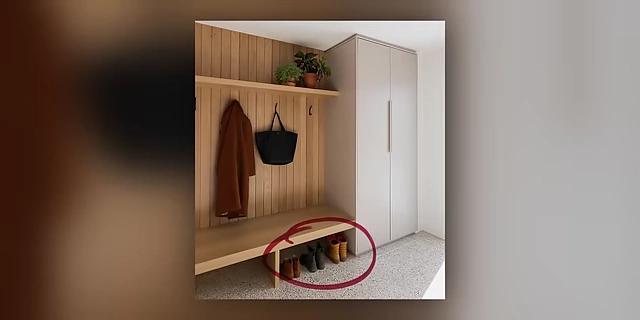 An entryway storage solution featuring a bench and designated space for shoes, circled to highlight the drop zone.
