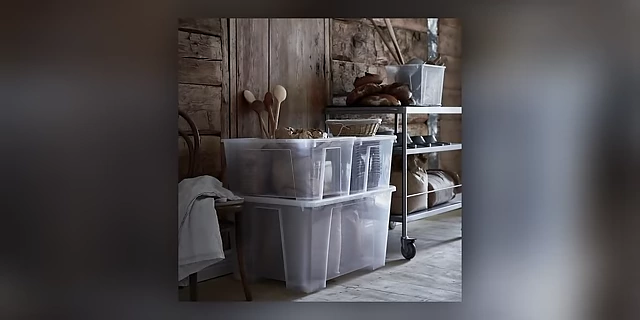 Large clear storage bins, suitable for use as 'transition bins' to temporarily hold items for decluttering.