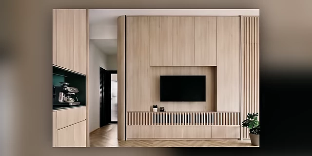 A living room showcasing extensive built-in wall cabinetry integrated around a television.