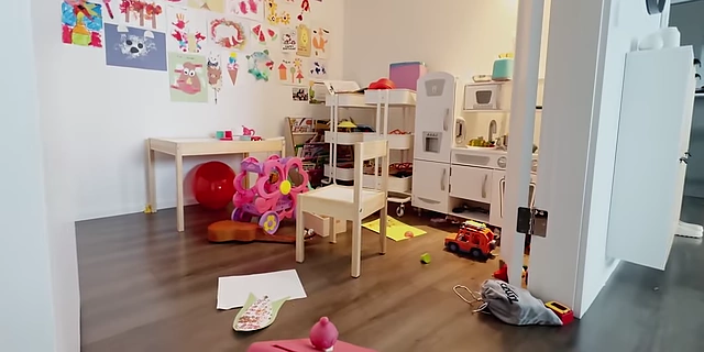 A child's playroom, demonstrating the common challenge of toy clutter.