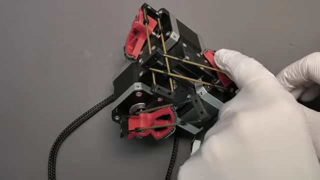Attaching the pre-assembled arms to the main structure of the micro-manipulator