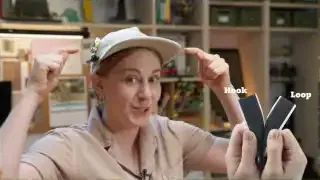 Simone points to her hat and shows hook and loop fabric samples.
