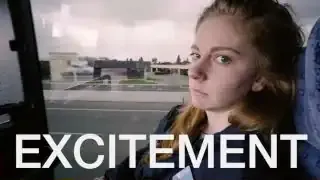 Simone Giertz with a text overlay "EXCITEMENT" on a bus, looking unhappy.