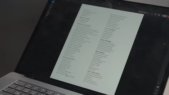 A laptop screen displays the recipe index for Nick's cookbook.