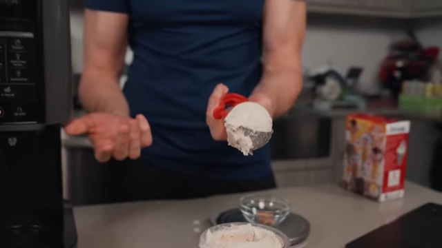 A perfectly scooped ball of Cinnamon Toast Crunch ice cream.
