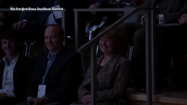 MrBeast's mother watching him speak at the summit.