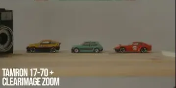A shot demonstrating the extended reach achieved with the Tamron 17-70mm lens using Sony's Clear Image Zoom feature, focusing on small toy cars.