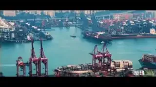 Chinese vessels in a port with shipping containers