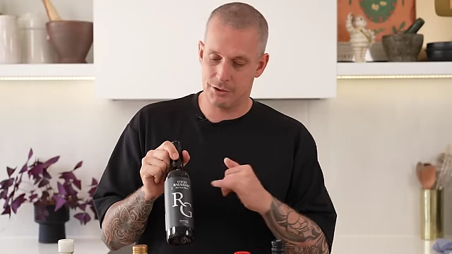 A bottle of balsamic glaze, recommended by Andy for its convenience and balanced sweetness and sharpness in quick salads.