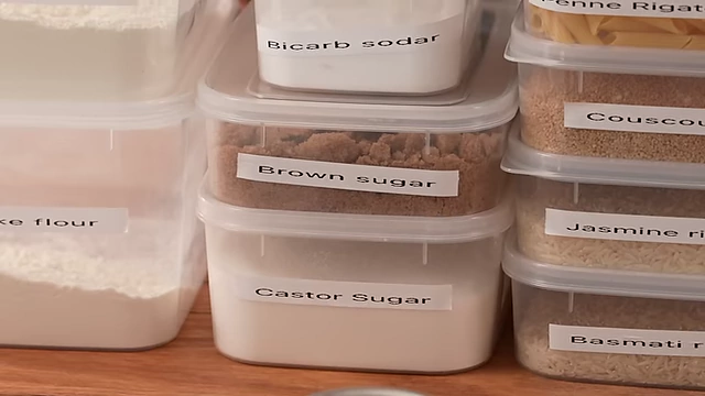 Labeled containers of brown sugar and caster sugar, highlighted as the two most versatile sugars for beginner cooks.