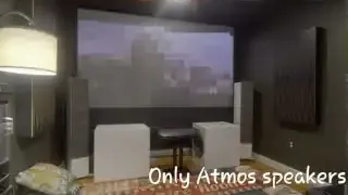 The movie clip playing on the screen with "Only Atmos speakers" overlaid, isolating the overhead audio effects.