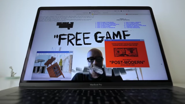 A laptop screen displaying Virgil Abloh's 'FREE GAME' website and scholarship fund