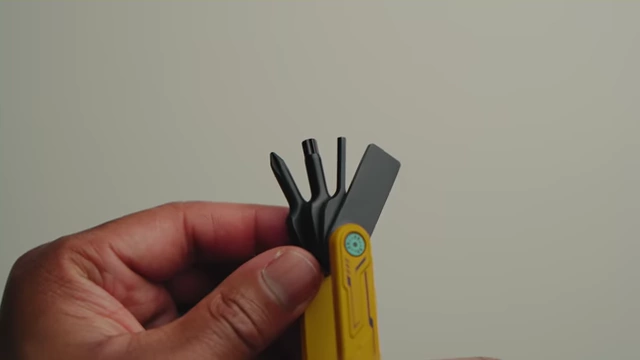 The multi-tool with its various hex and flathead tools extended