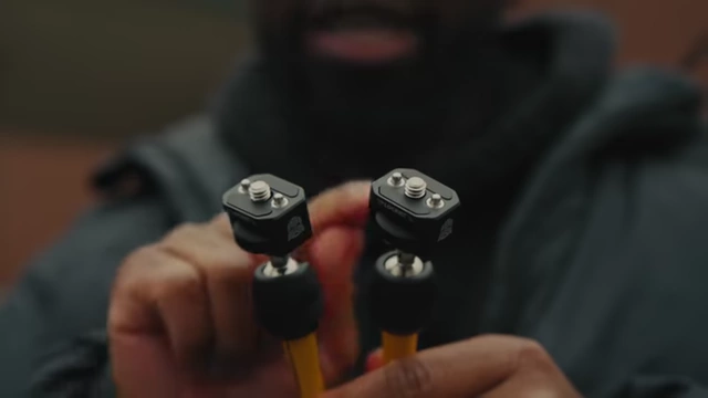Close-up of the 1/4-20 screws and locking pins on the Rosette Arm