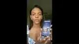 Candace Owens is seen holding the Freedom Phone, urging viewers to purchase it using her discount code, highlighting its promotion by conservative figures.