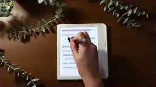 A hand annotating on the Kobo Libra Colour with a stylus.