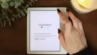 A Kobo Libra Colour displaying the OverDrive login screen.