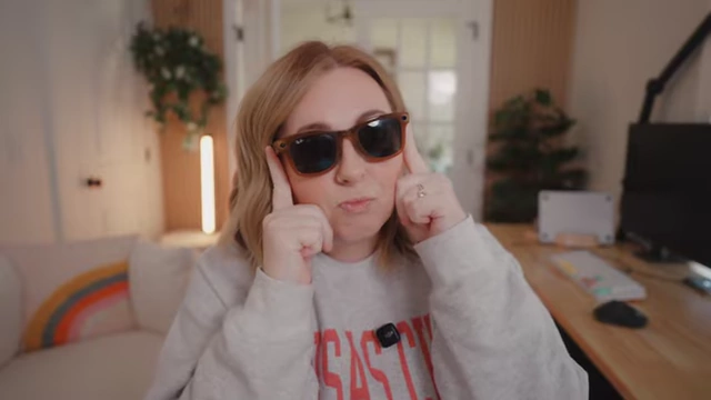 The speaker wears Meta Ray-Ban smart glasses, demonstrating their hands-free video recording capability.