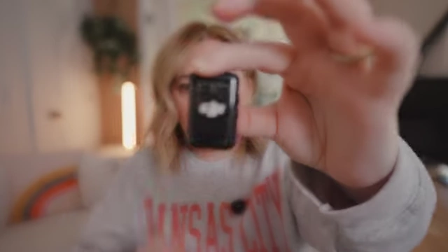 The speaker displays the tiny DJI Mic Mini, emphasizing its small form factor.