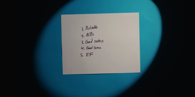 A handwritten list of the five non-negotiable camera requirements.