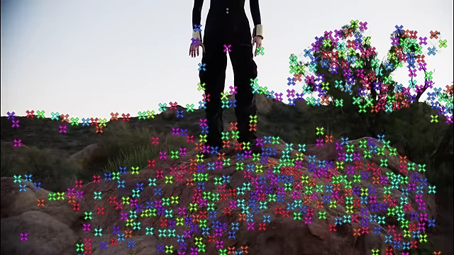 After Effects showing tracking points on footage with a boosted exposure.