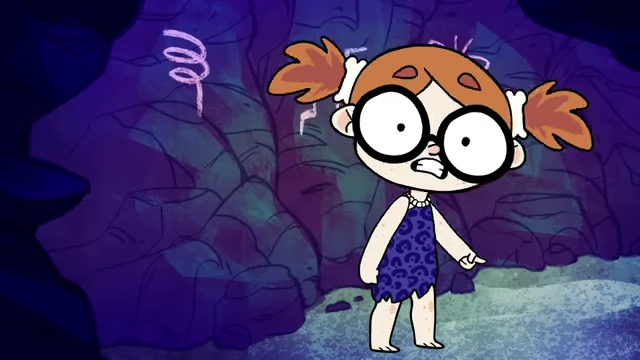 The speaker, depicted in a cave with stick figures, criticizes the lack of advanced pain relief for IUD insertion, comparing the medical approach to the Stone Age.