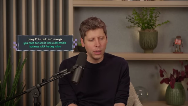 Sam Altman emphasizes that using AI is not enough; businesses need to build a defensible layer with lasting value.