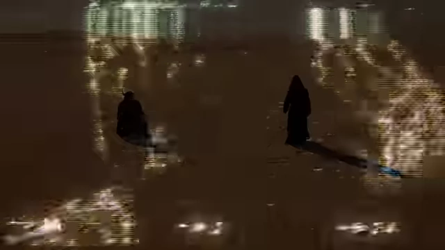 An animated silhouette of two figures, with one (Crowley) stepping into a glitching triangle, symbolizing his decision to become possessed by Choronzon